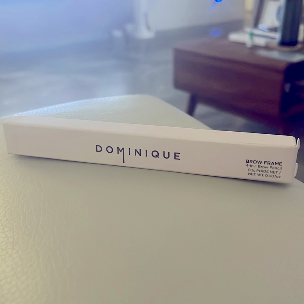 Dominique- Taupe colored eyebrow pencil.